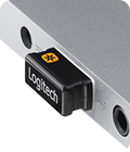 Close up of a Unifying receiver in a laptop USB port