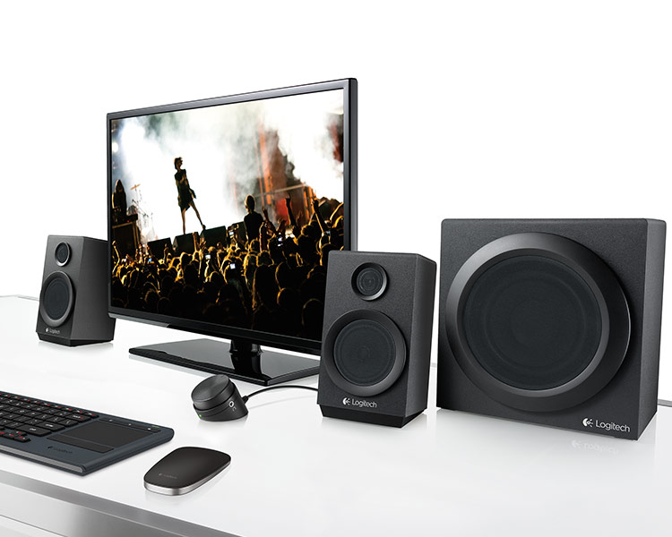 TV with Z333 satelites and subwoofer on glass top stand