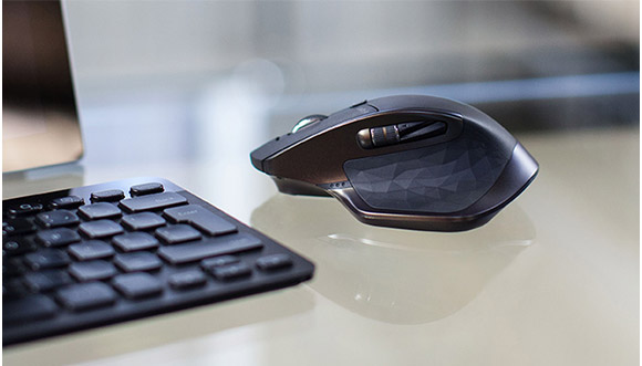 MX Master on glass desk