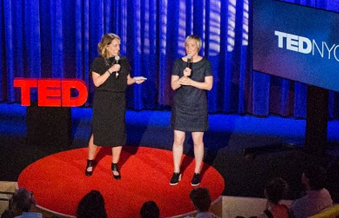 Two women giving presentations together