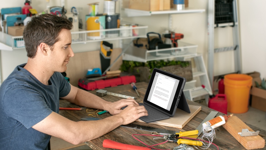 Rugged Folio | a man typing on his study room