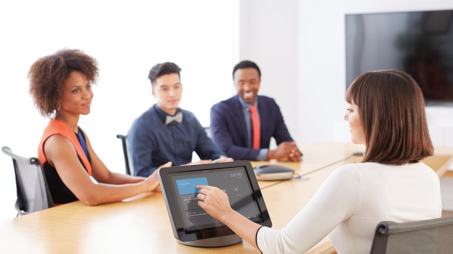 People around video conference table