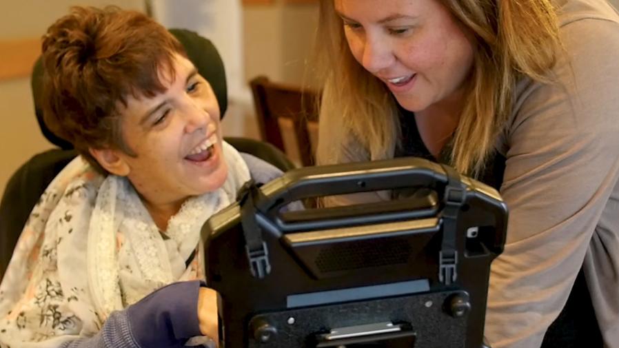 Woman assisting disables lady