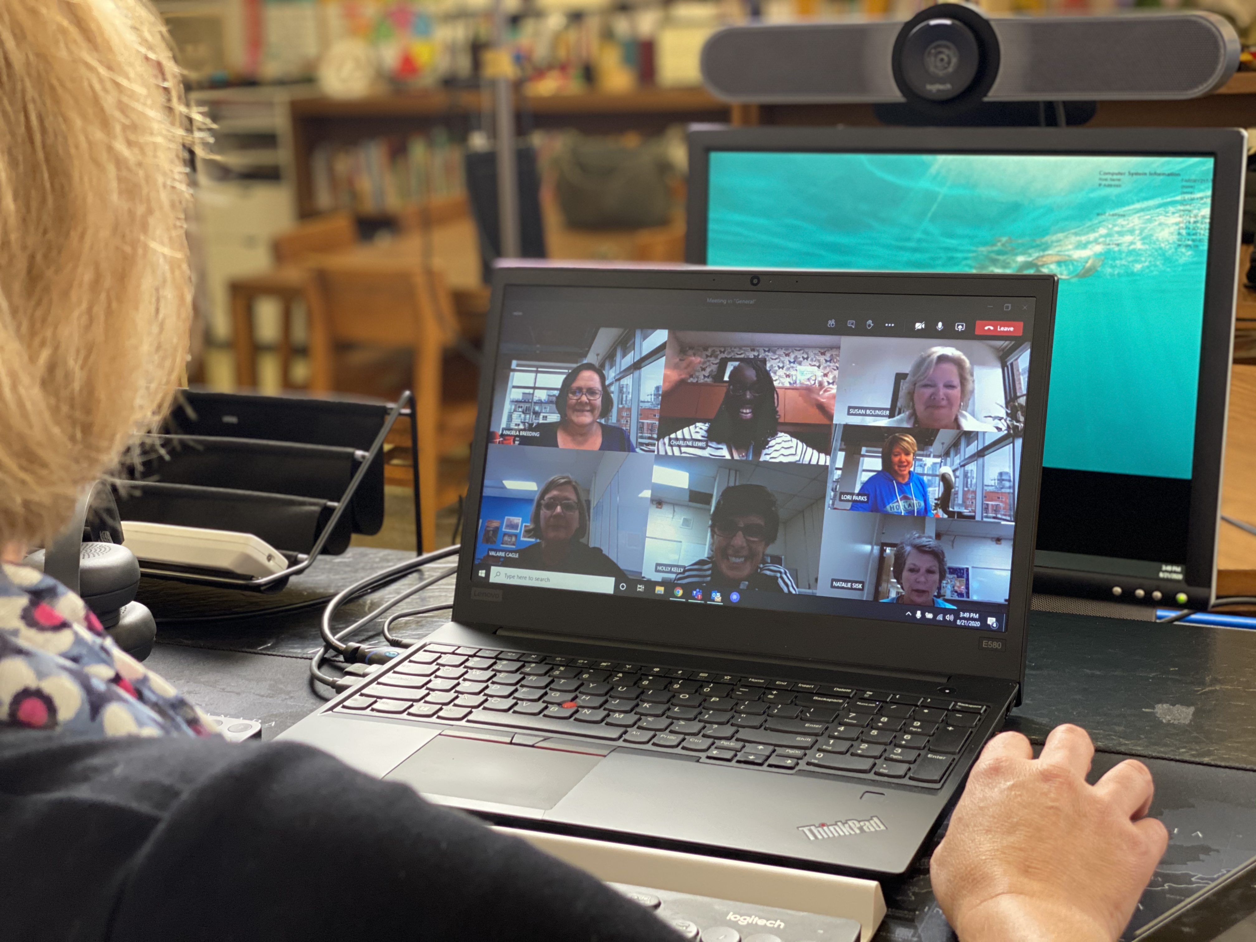 Teacher using Rally Bar to videoconference