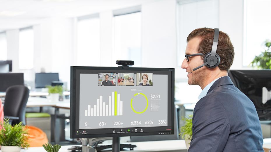 A man in video conferencing with logitech products